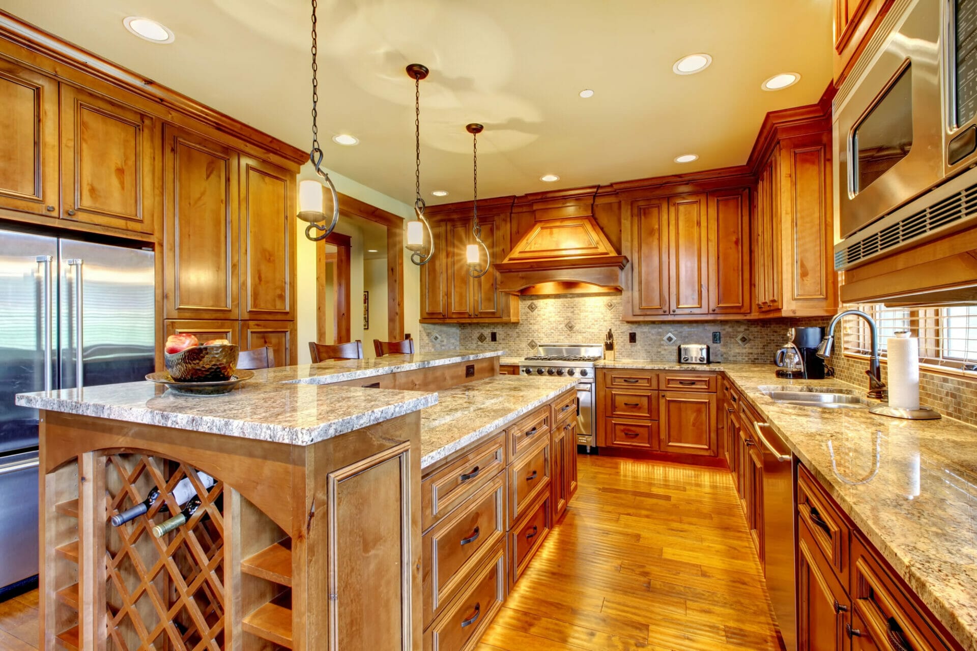 Custom luxury kitchen with wooden cabinets and granite counter tops