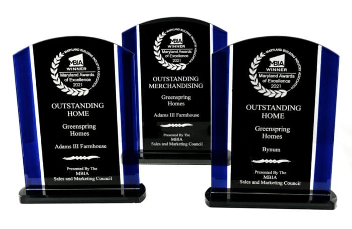 Awards plaques for three outstanding homes from the Maryland Awards of Excellence